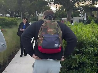 Guy moons his friend and shows nice pale globes