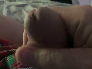 A guy playing with his dick till precum oozes out if your like me I love eating the cum so sit back and watch it