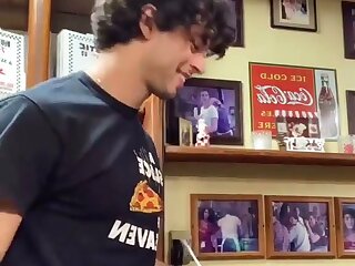 Cute chef shows off his hunky complexion in his apron. I'd let him put extra meat on my pepperoni!